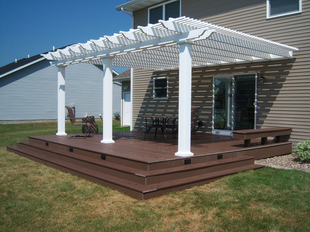 16x20 Attached white vinyl pergola attached to house 7 square columns and 75 shade option